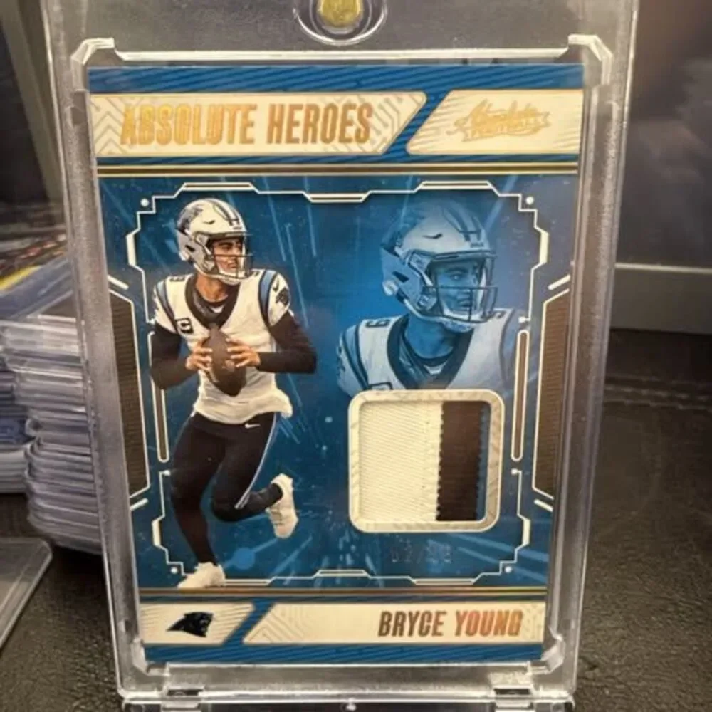 2024 Panini Absolute - Absolute Heroes Memorabilia Gold #AHM-BYG Bryce Young /99